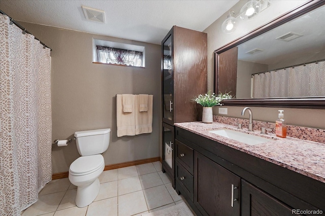 1248 Rawhide Cir, Elizabeth, CO 80107 - bathroom with vanity and tile patterned flooring