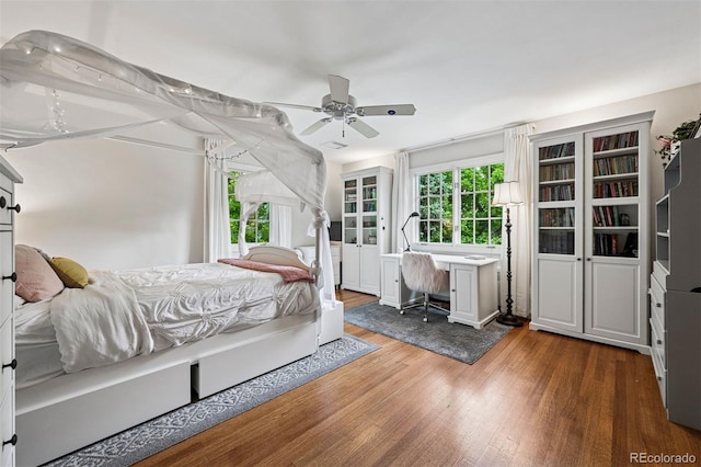 6300 E 17th Avenue Parkway, Denver, CO 80220 - bedroom featuring wood finished floors and a ceiling fan