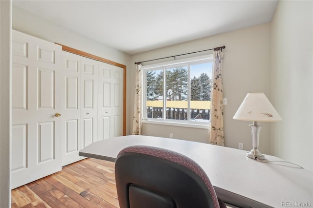 office space with hardwood / wood-style floors