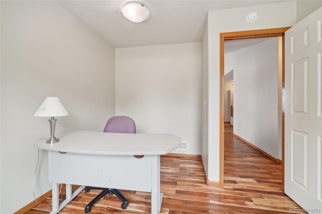 office featuring wood-type flooring