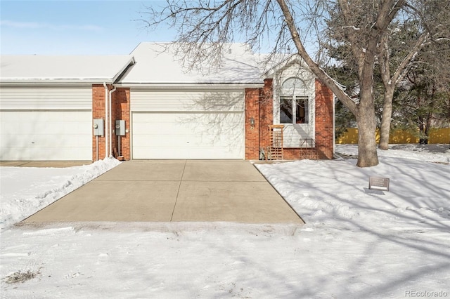 view of snow covered garage