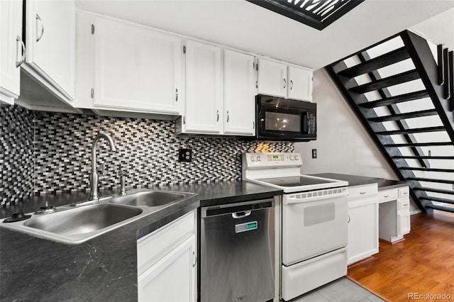 1885 S Quebec Way Unit A28, Denver, CO 80231 - kitchen featuring black microwave, dishwasher, white range with electric stovetop, a sink, and dark countertops