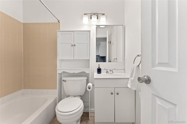 1885 S Quebec Way Unit A28, Denver, CO 80231 - full bathroom featuring vanity, toilet, and bathtub / shower combination