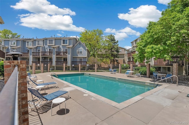1885 S Quebec Way Unit A28, Denver, CO 80231 - community pool with a residential view and a patio