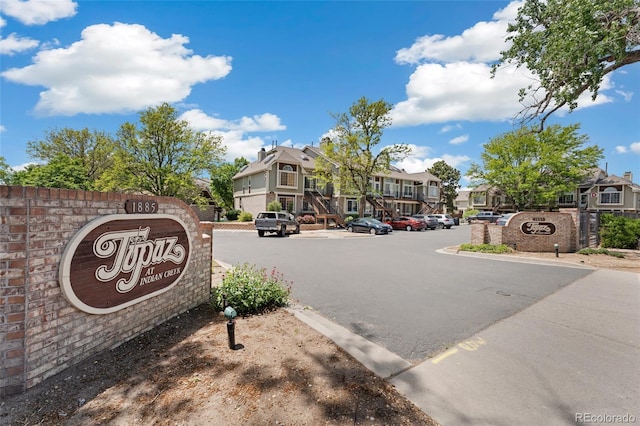 1885 S Quebec Way Unit A28, Denver, CO 80231 - view of asphalt road featuring a residential view and curbs