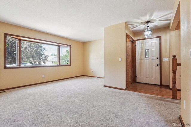 4720 S Grant St, Englewood, CO 80113 - carpeted empty room featuring baseboards