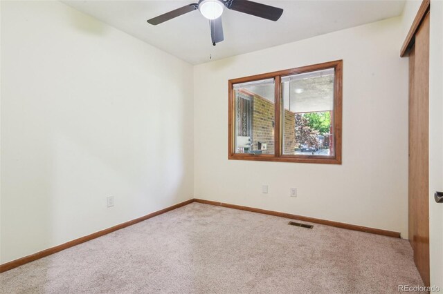 4720 S Grant St, Englewood, CO 80113 - empty room featuring carpet and ceiling fan