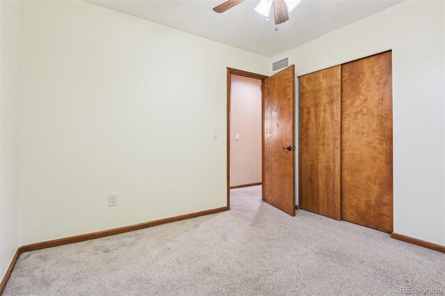 4720 S Grant St, Englewood, CO 80113 - unfurnished bedroom featuring light colored carpet, a closet, and ceiling fan