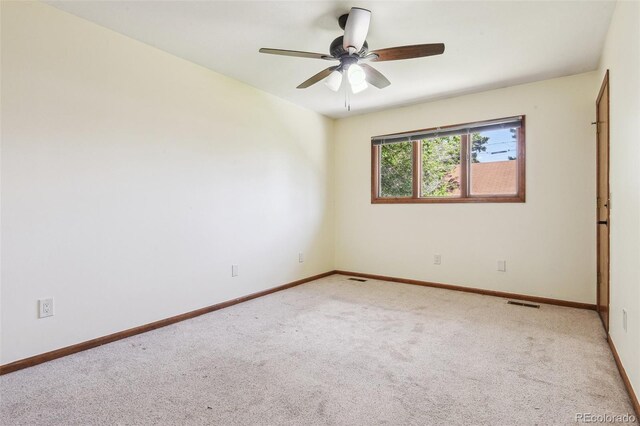 4720 S Grant St, Englewood, CO 80113 - carpeted spare room with baseboards and a ceiling fan