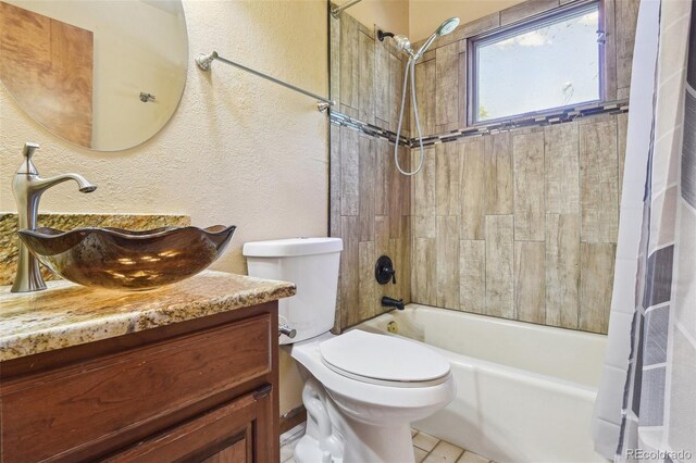 4720 S Grant St, Englewood, CO 80113 - full bath with a textured wall, vanity, and bathing tub / shower combination