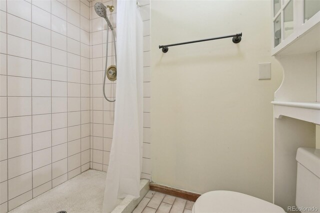 4720 S Grant St, Englewood, CO 80113 - full bathroom featuring toilet and a shower stall