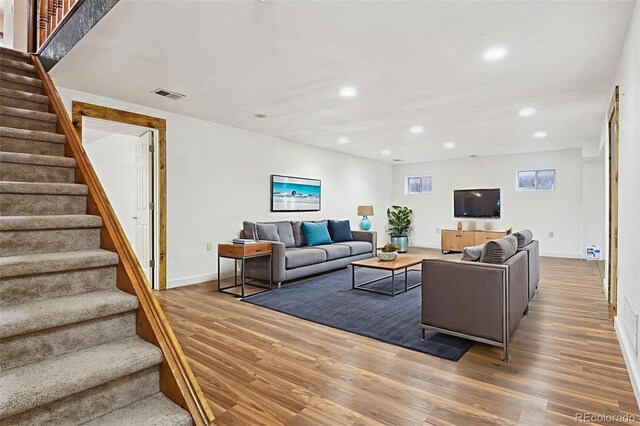 4720 S Grant St, Englewood, CO 80113 - living area featuring recessed lighting, wood finished floors, and stairway