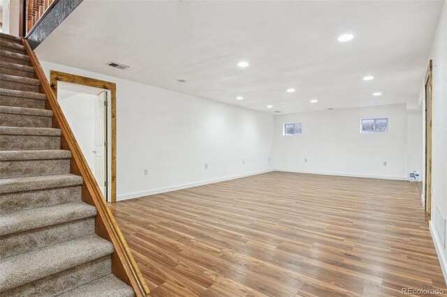 4720 S Grant St, Englewood, CO 80113 - basement with stairs, light wood finished floors, and recessed lighting