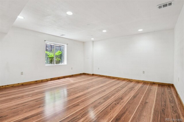 4720 S Grant St, Englewood, CO 80113 - spare room featuring recessed lighting and wood finished floors