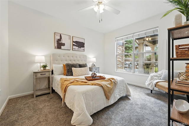 carpeted bedroom with baseboards and ceiling fan