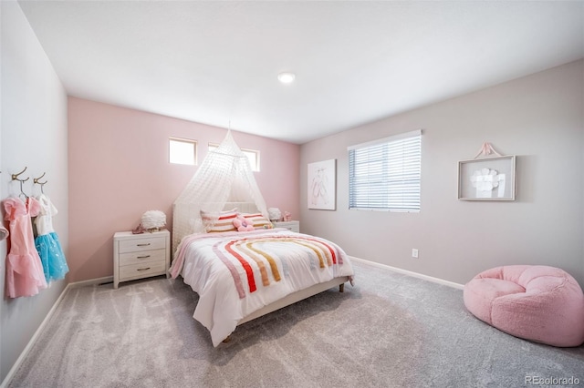 3879 N Shawnee St, Aurora, CO 80019 - carpeted bedroom with baseboards