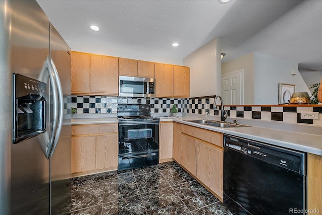 kitchen with light brown cabinets, sink, and black appliances