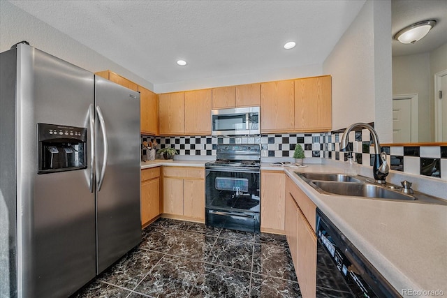 kitchen with decorative backsplash, light brown cabinets, sink, and black appliances