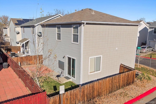 back of property with a patio area