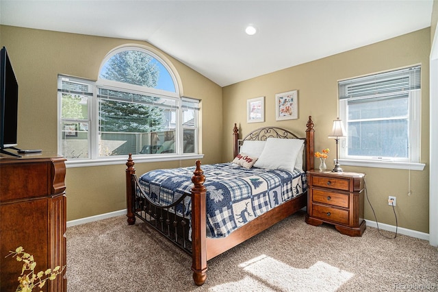 carpeted bedroom featuring vaulted ceiling