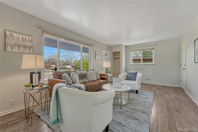 7541 Julian St, Westminster, CO 80030 - living area featuring wood finished floors and baseboards