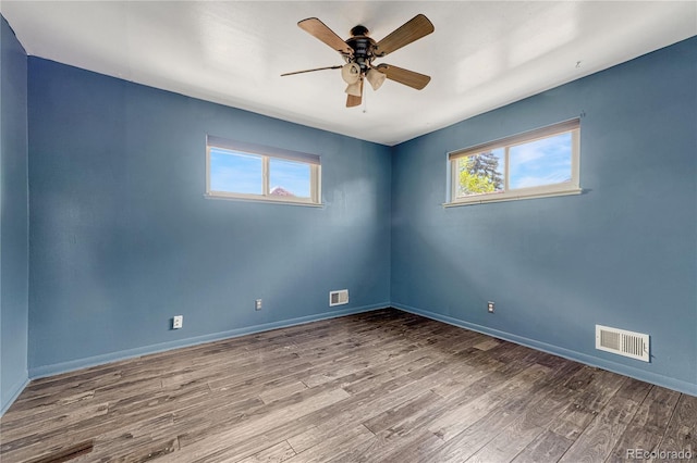 7541 Julian St, Westminster, CO 80030 - spare room featuring wood finished floors, baseboards, and a ceiling fan