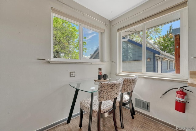 7541 Julian St, Westminster, CO 80030 - dining room featuring wood finished floors and baseboards