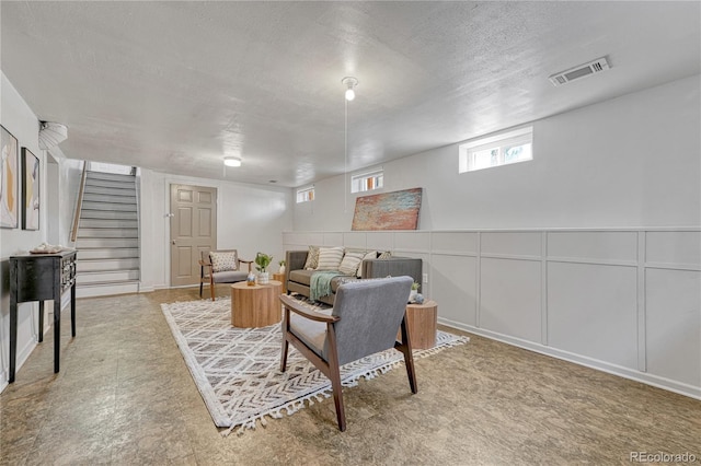 7541 Julian St, Westminster, CO 80030 - living room with stairway and a textured ceiling