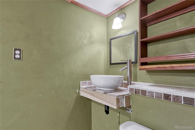 7541 Julian St, Westminster, CO 80030 - half bathroom featuring a sink