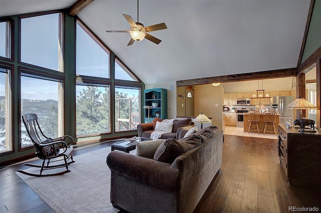 living room featuring ceiling fan, wood-type flooring, beam ceiling, and high vaulted ceiling