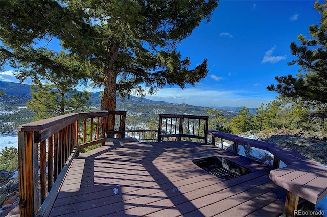 deck featuring a mountain view