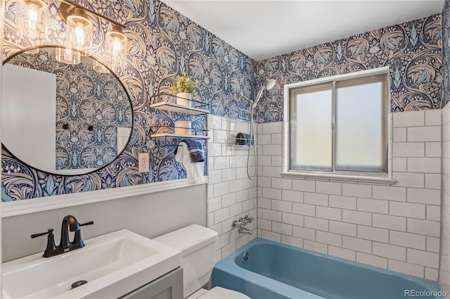 full bathroom with toilet, vanity, shower / washtub combination, and wallpapered walls