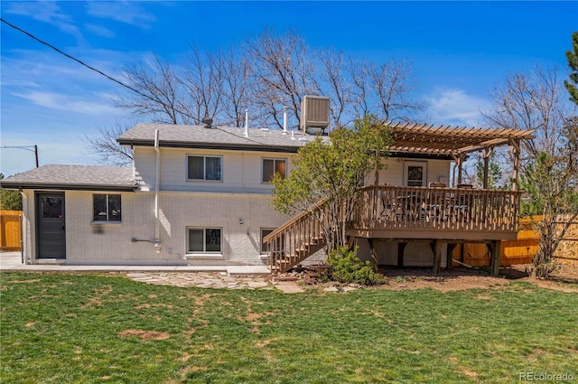 back of property featuring stairway, a deck, a lawn, and cooling unit