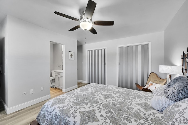 bedroom with ceiling fan, light wood-type flooring, and ensuite bath