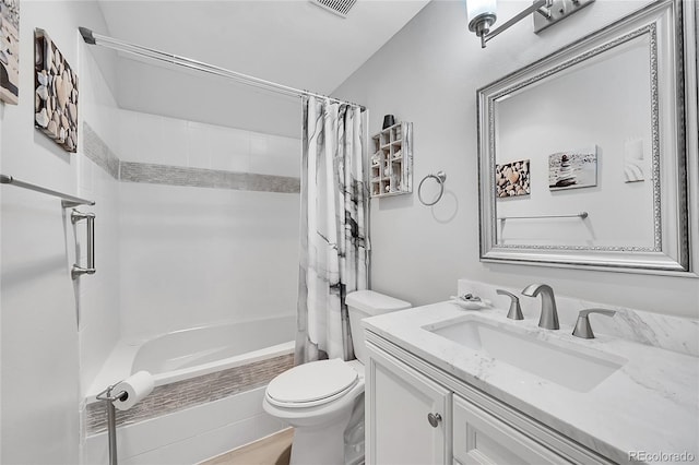 full bathroom featuring vanity, shower / tub combo with curtain, and toilet