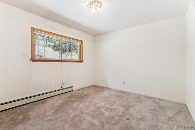 3909 County Road 72, Bailey, CO 80421 - carpeted spare room featuring a baseboard heating unit