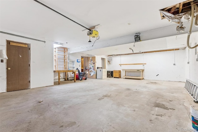 3909 County Road 72, Bailey, CO 80421 - garage with a garage door opener