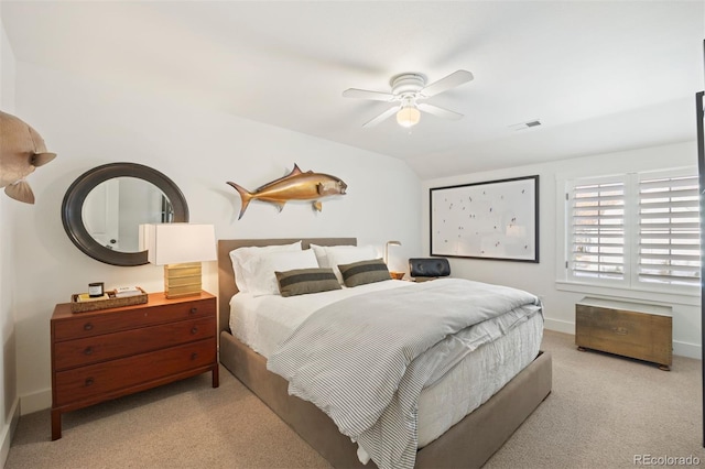 carpeted bedroom featuring ceiling fan and lofted ceiling