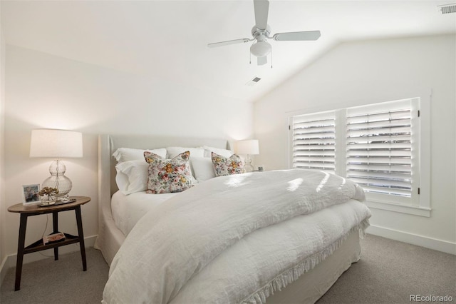 bedroom with lofted ceiling, carpet, multiple windows, and ceiling fan