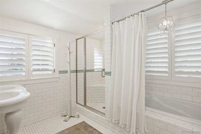 bathroom with tile patterned flooring and plus walk in shower