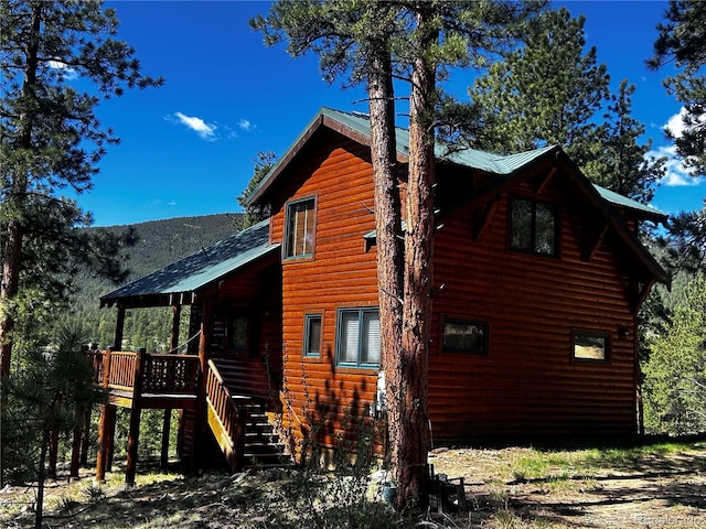 view of property exterior with stairs