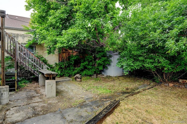 1707 W 39th Ave, Denver, CO 80211 - view of yard with a shed and stairs