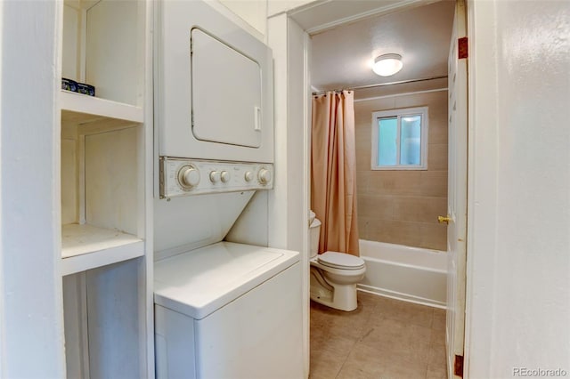1707 W 39th Ave, Denver, CO 80211 - laundry room with stacked washing machine and dryer and light tile patterned floors