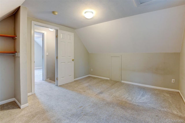 1707 W 39th Ave, Denver, CO 80211 - additional living space featuring carpet and lofted ceiling