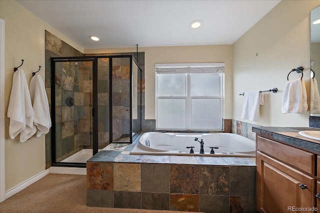 15258 W 75th Pl, Arvada, CO 80007 - full bathroom with a bath, vanity, a shower stall, and recessed lighting