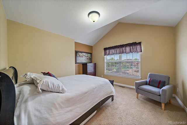 15258 W 75th Pl, Arvada, CO 80007 - carpeted bedroom with vaulted ceiling and baseboards