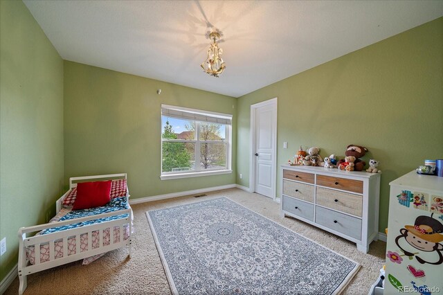 15258 W 75th Pl, Arvada, CO 80007 - carpeted bedroom featuring baseboards