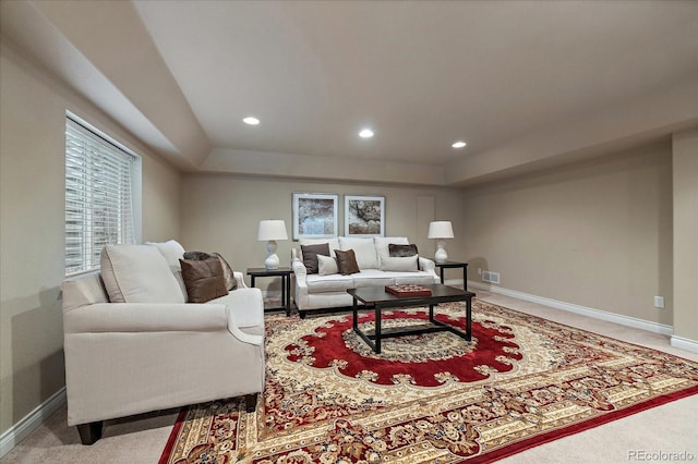 15258 W 75th Pl, Arvada, CO 80007 - living room with a raised ceiling, light carpet, recessed lighting, and baseboards