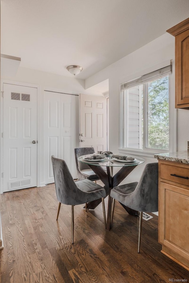 2260 Lilly Dr, Thornton, CO 80229 - dining space featuring wood finished floors
