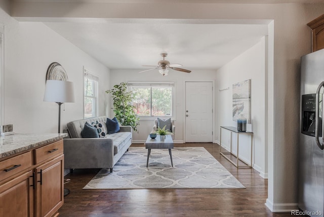 2260 Lilly Dr, Thornton, CO 80229 - living room with dark wood-style floors and a ceiling fan